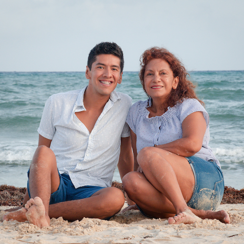 mother and son in a photo session by the beach in playa del carmen