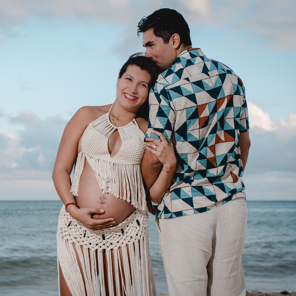 couple maternity photo session at the beach in playa del carmen